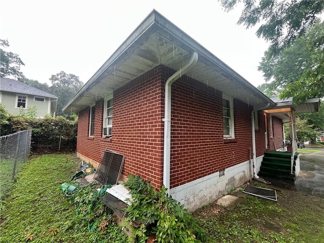 301 Sisson Ave NE, Atlanta, GA 30317 - view of home's exterior with brick siding and cooling unit