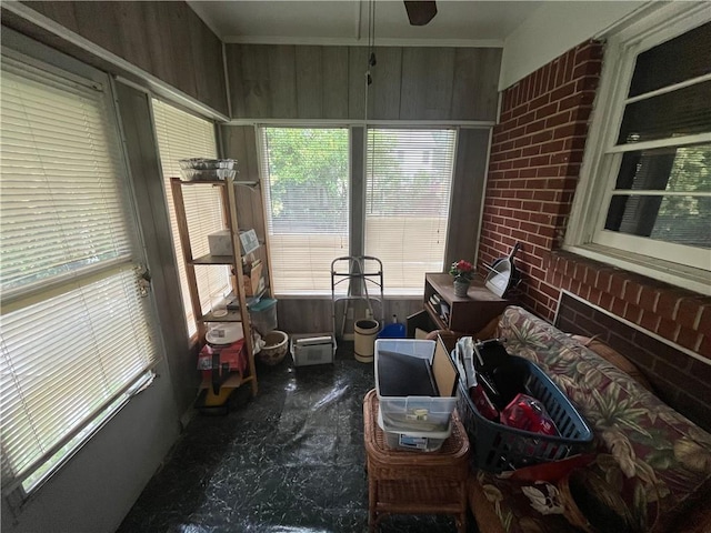 301 Sisson Ave NE, Atlanta, GA 30317 - sunroom featuring brick wall and a ceiling fan