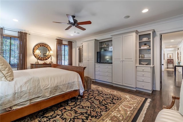 bedroom featuring ornamental molding, dark wood-style flooring, a ceiling fan, and recessed lighting