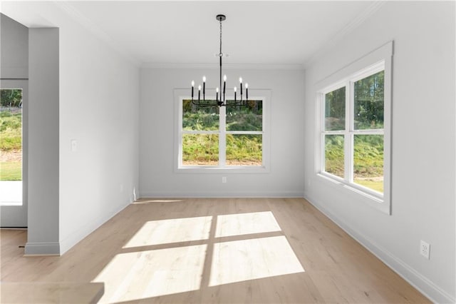 unfurnished dining area featuring a wealth of natural light and light hardwood / wood-style flooring