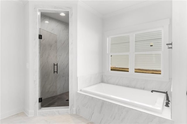 bathroom featuring separate shower and tub and crown molding