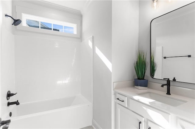 bathroom featuring vanity, shower / washtub combination, and ornamental molding