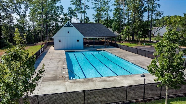 view of swimming pool with a patio area