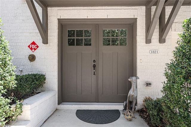 1821 Huntington Hills Ln NW, Atlanta, GA 30309 - view of exterior entry with brick siding