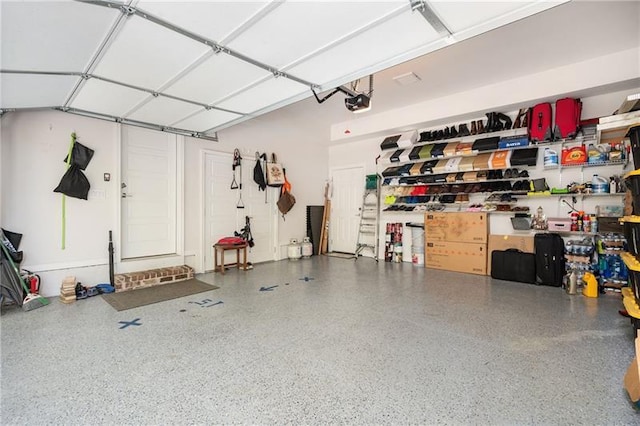 1821 Huntington Hills Ln NW, Atlanta, GA 30309 - garage featuring a garage door opener