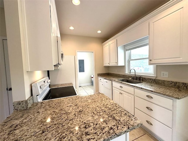 44 Powell Rd NW, Adairsville, GA 30103 - kitchen with a sink, white appliances, white cabinets, light tile patterned flooring, and recessed lighting