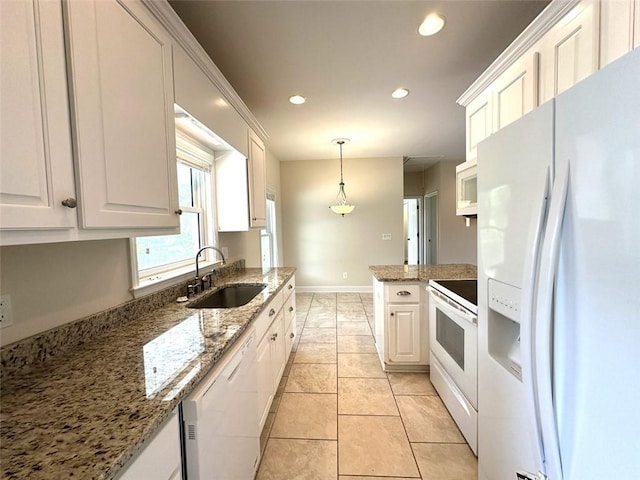 44 Powell Rd NW, Adairsville, GA 30103 - kitchen featuring white appliances, a sink, white cabinetry, recessed lighting, and hanging light fixtures
