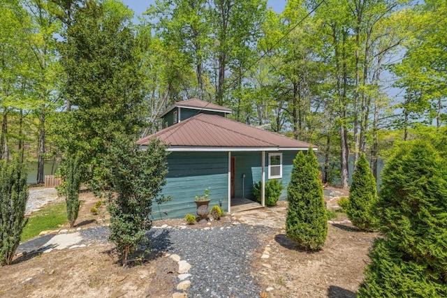 view of front of house featuring metal roof