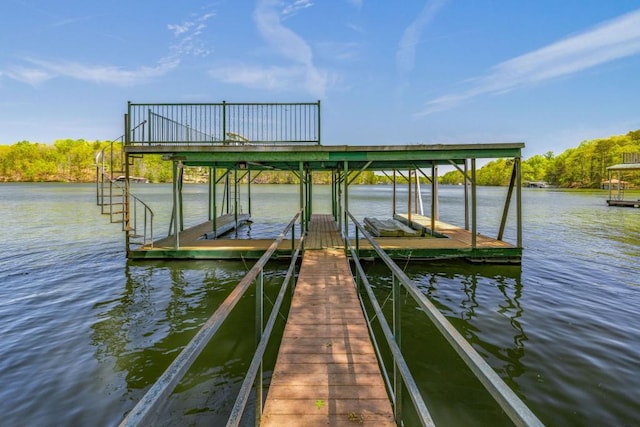 dock with a water view and boat lift