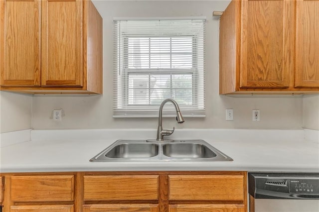 3623 Thurleston Ct SW, Marietta, GA 30008 - kitchen with stainless steel dishwasher, light countertops, and brown cabinets