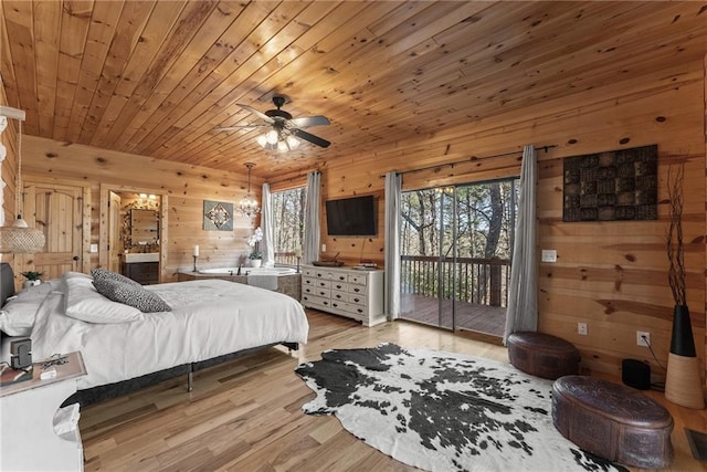 bedroom featuring wood ceiling, wooden walls, access to exterior, and light wood-style floors