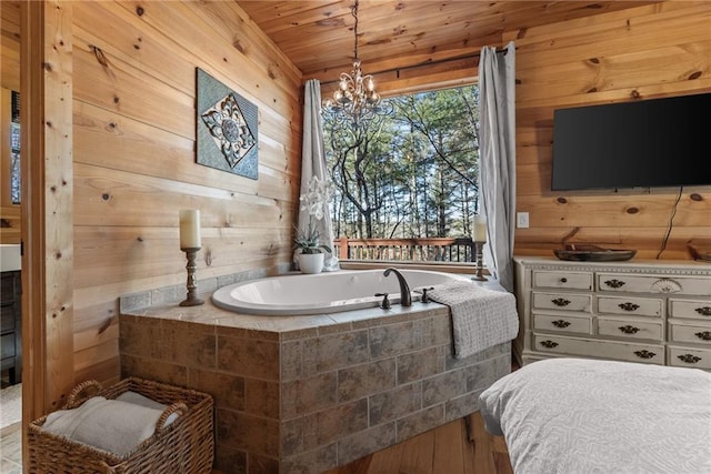bathroom with wood ceiling, a chandelier, wooden walls, a bath, and wood finished floors