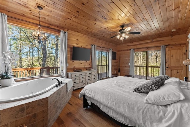 bedroom with a chandelier, access to outside, wooden walls, wood ceiling, and dark wood finished floors