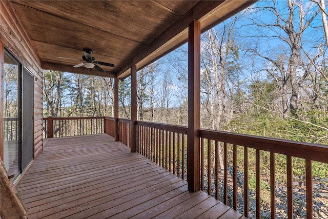 wooden terrace featuring ceiling fan