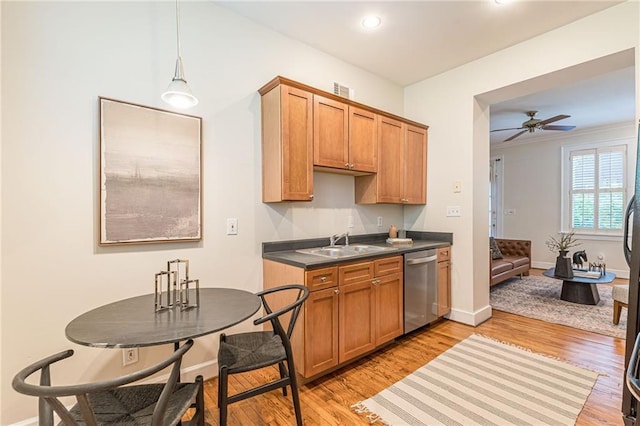 1015 Piedmont Ave NE Unit A2, Atlanta, GA 30309 - kitchen featuring light wood-type flooring, stainless steel dishwasher, a sink, dark countertops, and ceiling fan