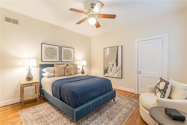 1015 Piedmont Ave NE Unit A2, Atlanta, GA 30309 - bedroom featuring baseboards, visible vents, and wood finished floors