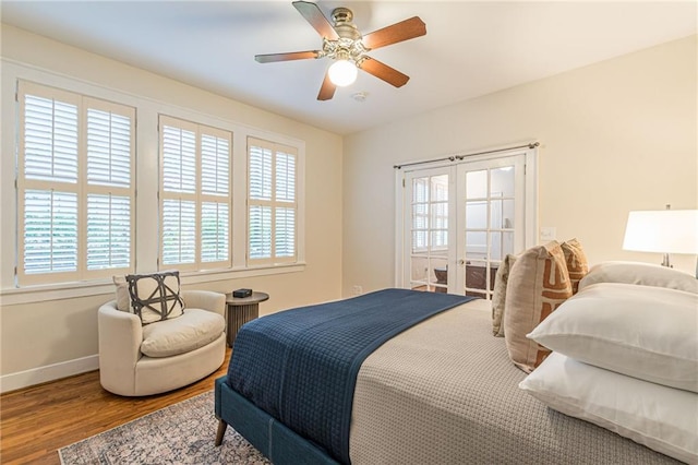 1015 Piedmont Ave NE Unit A2, Atlanta, GA 30309 - bedroom featuring baseboards, wood finished floors, french doors, and multiple windows