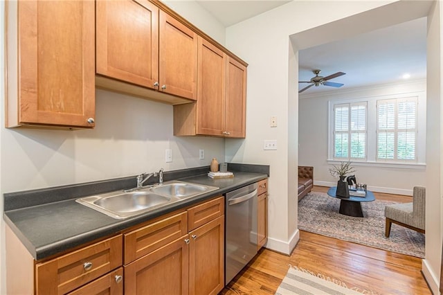 1015 Piedmont Ave NE Unit A2, Atlanta, GA 30309 - kitchen with light wood-style flooring, ceiling fan, dark countertops, a sink, and stainless steel dishwasher