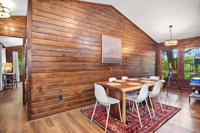 307 Pigeon Creek Rd, Blue Ridge, GA 30513 - dining room featuring lofted ceiling, wood walls, wood finished floors, and french doors