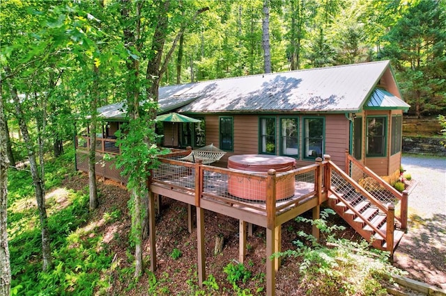 307 Pigeon Creek Rd, Blue Ridge, GA 30513 - back of house featuring a wooden deck and a metal roof