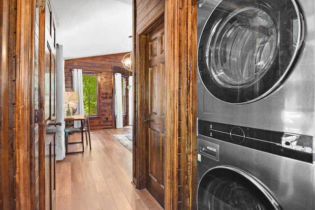 307 Pigeon Creek Rd, Blue Ridge, GA 30513 - laundry room featuring estacked washer and dryer, wood walls, and wood finished floors