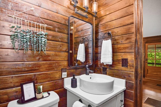 307 Pigeon Creek Rd, Blue Ridge, GA 30513 - half bathroom featuring wooden walls and vanity
