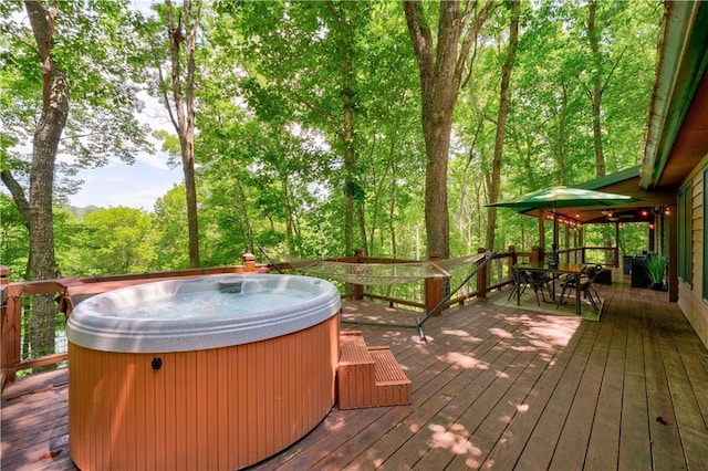 307 Pigeon Creek Rd, Blue Ridge, GA 30513 - wooden deck with a hot tub and outdoor dining area