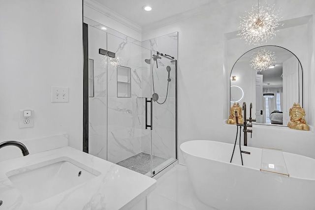 bathroom with a chandelier, vanity, separate shower and tub, and crown molding