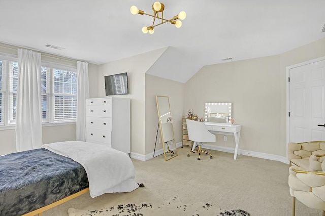 bedroom featuring vaulted ceiling, carpet floors, and an inviting chandelier