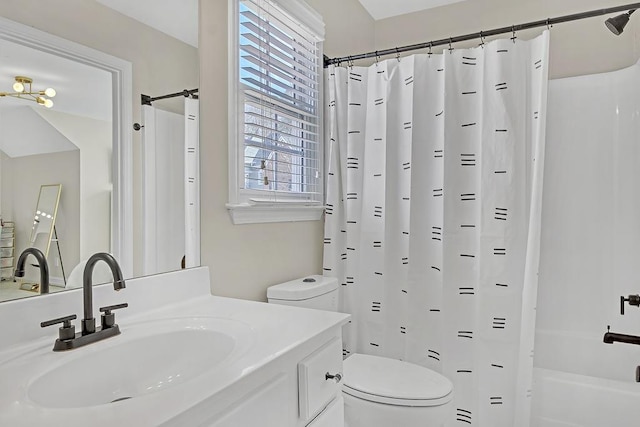 full bathroom featuring vanity, toilet, and shower / bath combo with shower curtain