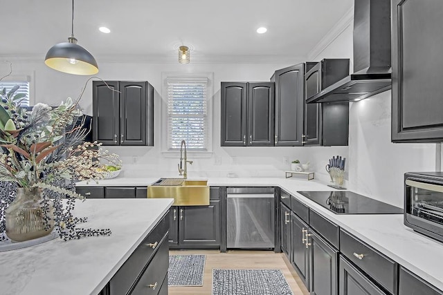 kitchen with dishwasher, wall chimney range hood, sink, ornamental molding, and decorative light fixtures