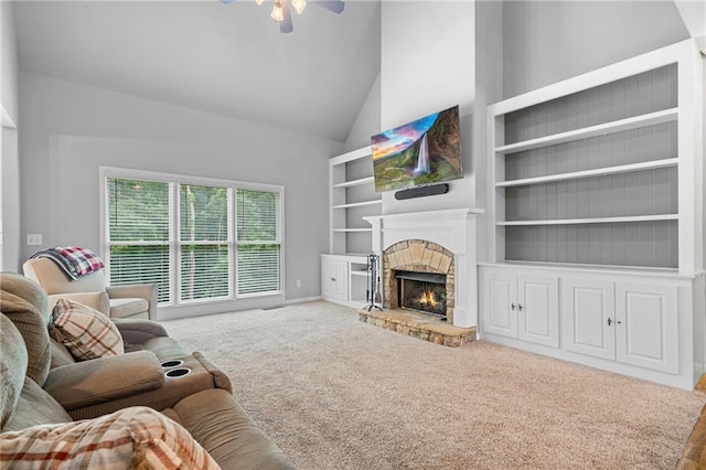4915 Lazy Creek Ct, Cumming, GA 30028 - carpeted living room with a fireplace, a ceiling fan, high vaulted ceiling, baseboards, and built in features