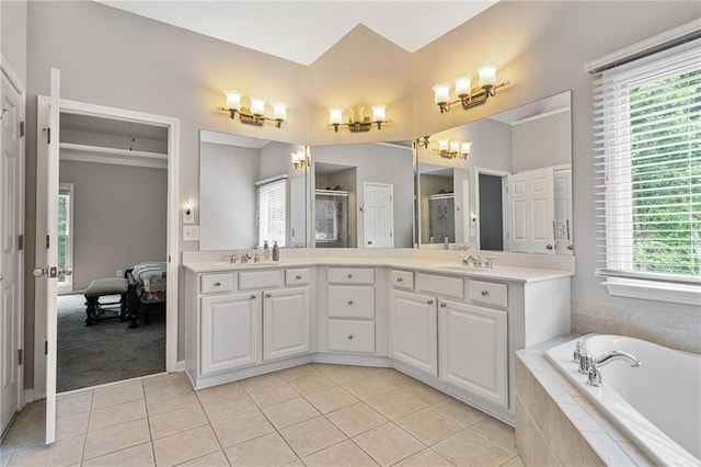 4915 Lazy Creek Ct, Cumming, GA 30028 - ensuite bathroom with double vanity, a chandelier, a stall shower, a bath, and tile patterned flooring