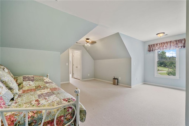 4915 Lazy Creek Ct, Cumming, GA 30028 - carpeted bedroom featuring baseboards, vaulted ceiling, and ceiling fan