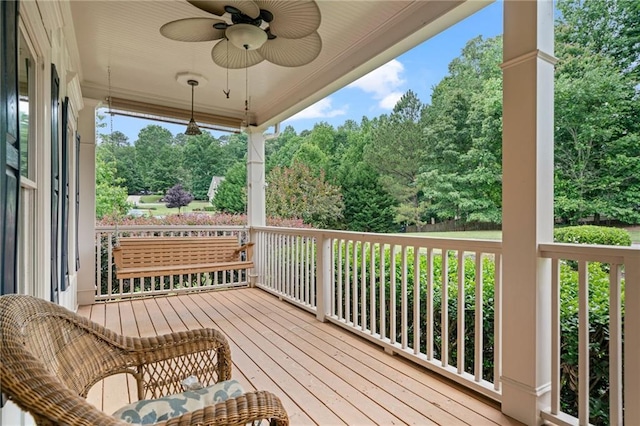 4915 Lazy Creek Ct, Cumming, GA 30028 - wooden terrace with a ceiling fan and view of scattered trees