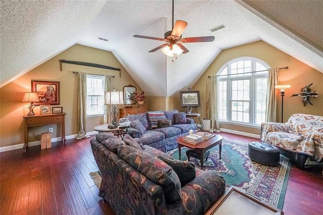 12 Blackfoot Trl, Sharpsburg, GA 30277 - living area with lofted ceiling, a ceiling fan, a textured ceiling, wood-type flooring, and baseboards