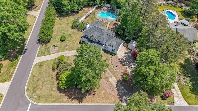 12 Blackfoot Trl, Sharpsburg, GA 30277 - drone / aerial view of a pool area