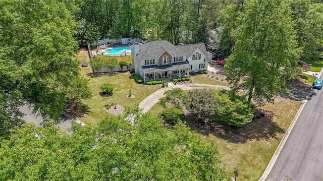 12 Blackfoot Trl, Sharpsburg, GA 30277 - aerial view of property and surrounding area with a pool area