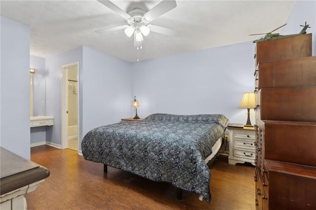 136 Pine St, Covington, GA 30014 - bedroom with wood finished floors and ceiling fan