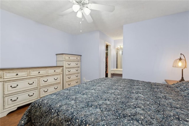 136 Pine St, Covington, GA 30014 - bedroom with wood finished floors and a ceiling fan
