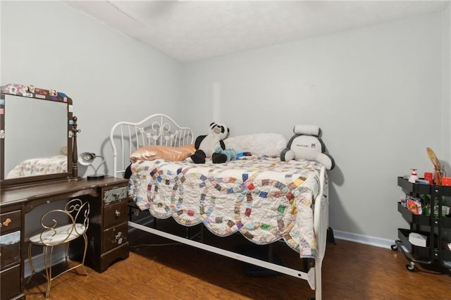 136 Pine St, Covington, GA 30014 - bedroom featuring wood finished floors and baseboards