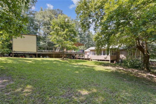 136 Pine St, Covington, GA 30014 - view of green lawn featuring a deck and a shed