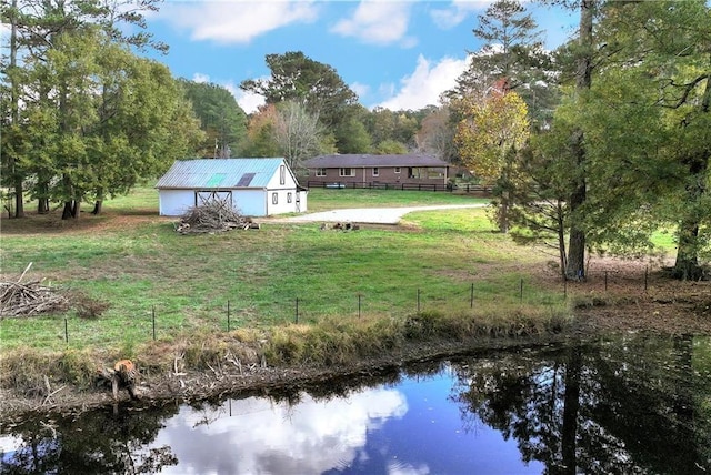 view of yard with a water view