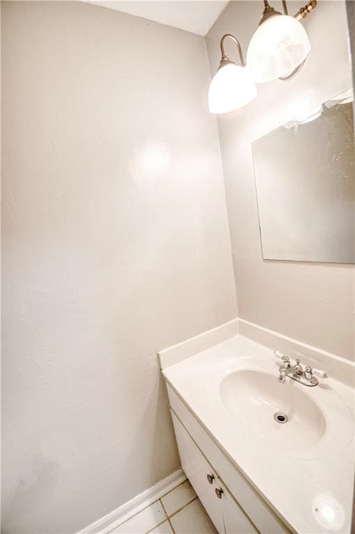 bathroom featuring tile patterned floors and vanity