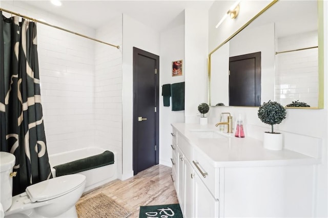 full bathroom with wood-type flooring, toilet, shower / bathtub combination with curtain, and vanity