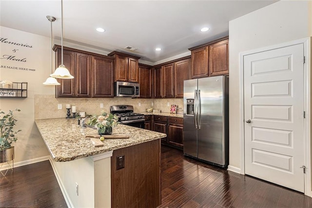 2149 Apple Orchard Way, Austell, GA 30168 - kitchen featuring stainless steel appliances, a peninsula, dark wood-style floors, dark brown cabinets, and recessed lighting