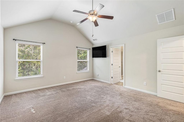 2149 Apple Orchard Way, Austell, GA 30168 - unfurnished bedroom featuring light colored carpet, lofted ceiling, baseboards, and a ceiling fan