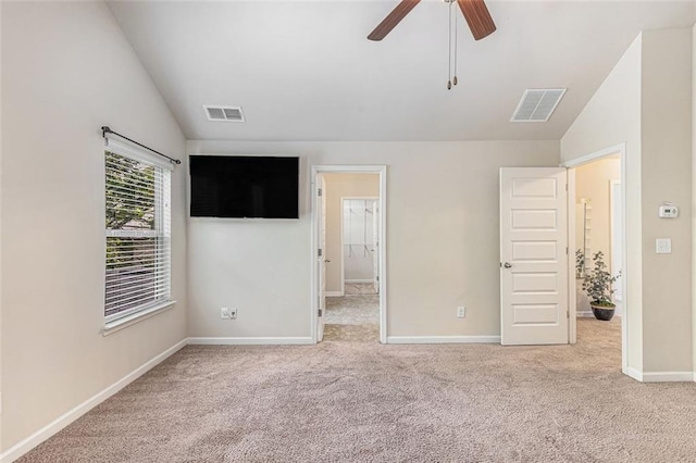 2149 Apple Orchard Way, Austell, GA 30168 - unfurnished bedroom with carpet flooring, vaulted ceiling, baseboards, and a ceiling fan