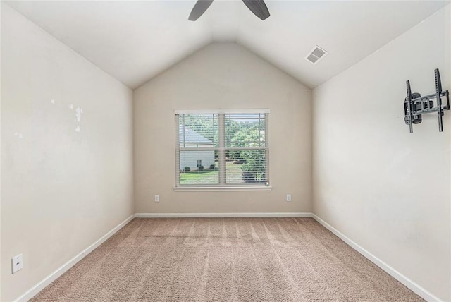 2149 Apple Orchard Way, Austell, GA 30168 - empty room with a ceiling fan, lofted ceiling, light colored carpet, and baseboards