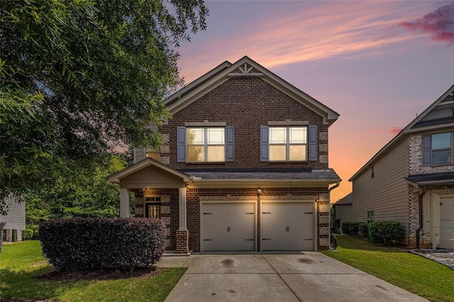 2149 Apple Orchard Way, Austell, GA 30168 - view of front of house with brick siding, an attached garage, driveway, and a lawn